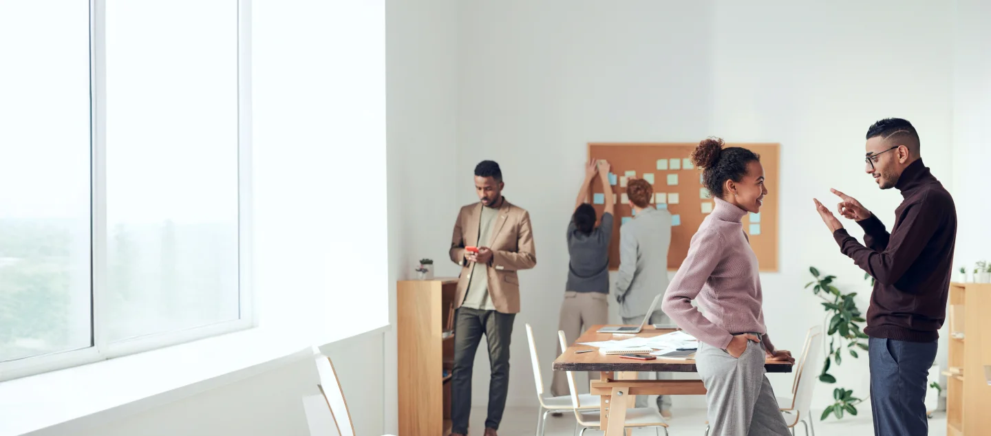 Committee members collaborating in a modern office environment
